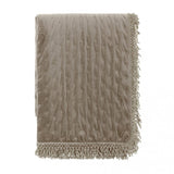 Trapunta in velluto con frange